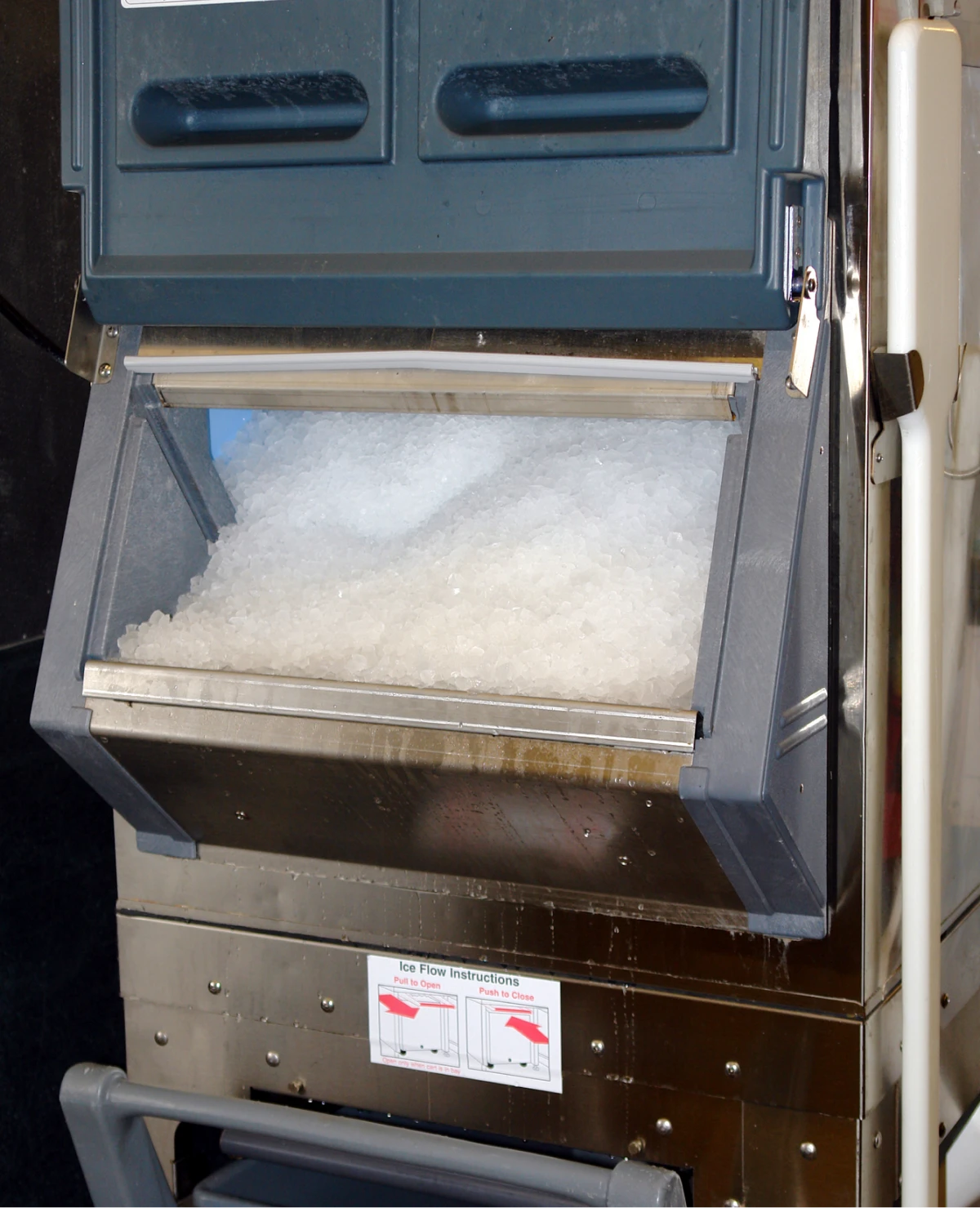 Ice machine full of fresh ice cubes